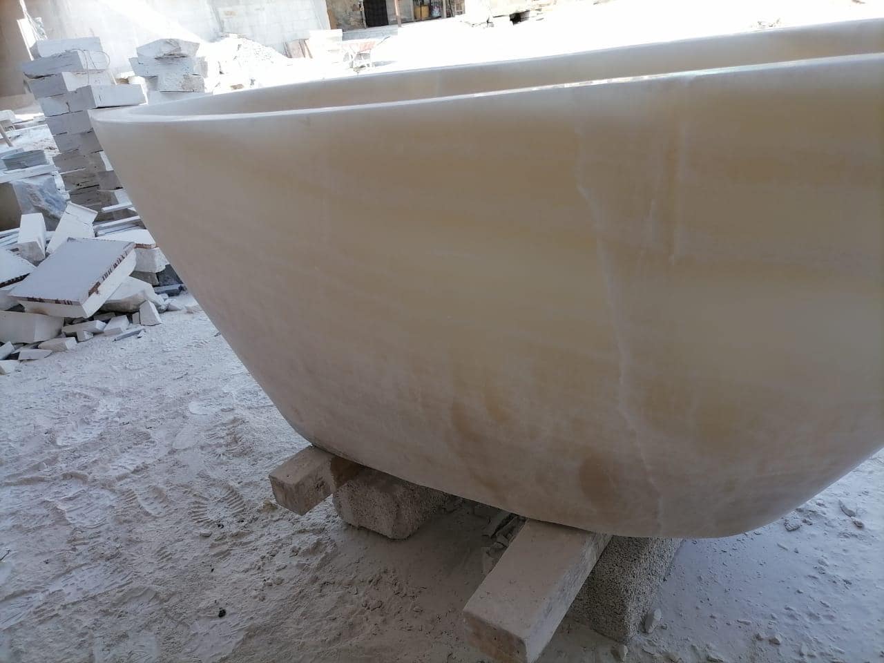 Onyx Bath Tub Hand Carved by our crew!