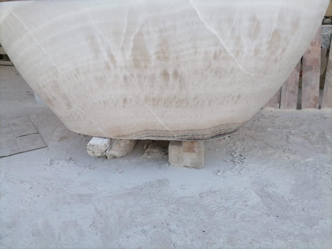 Onyx Bath Tub Hand Carved by our crew!