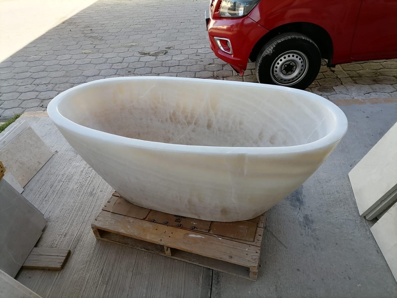 Onyx Bath Tub Hand Carved by our crew!