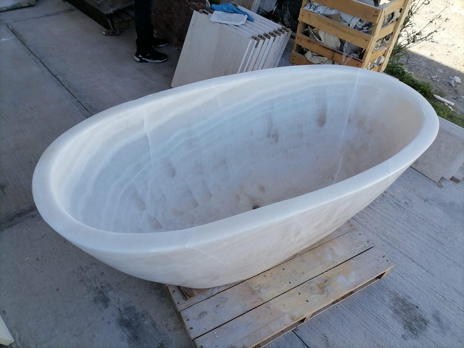 Onyx Bath Tub Hand Carved by our crew!