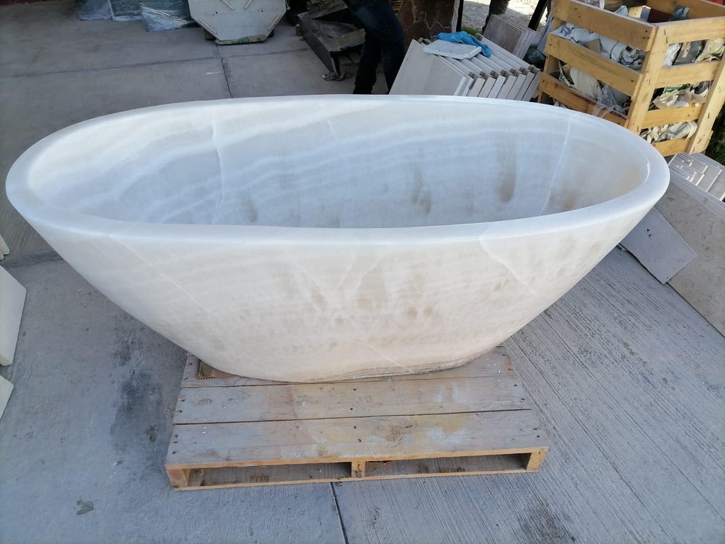 Onyx Bath Tub Hand Carved by our crew!