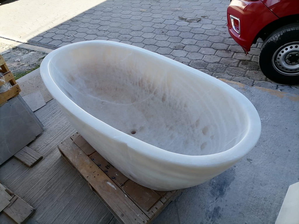 Onyx Bath Tub Hand Carved by our crew!